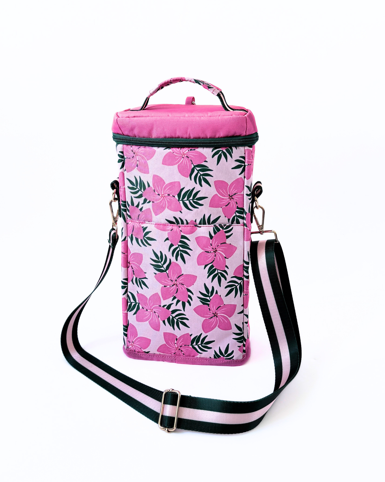 Floral-patterned bag with a pink top and black strap on a white background