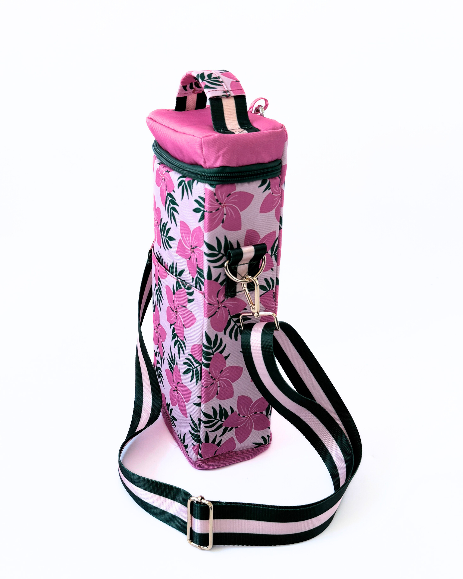 Pink floral water bottle holder with black and white striped strap on a white background