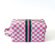 Pink and white checkered women’s golf pouch with green and white racer stripe
