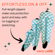 Blue and white checkered golf club covers with text on a pink background, featuring the brand 'Sassy Caddy'.